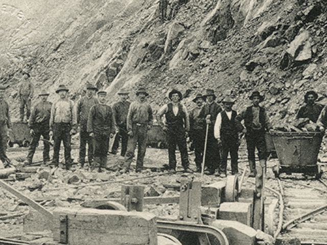 Employees mining iron ore in the 1890s.