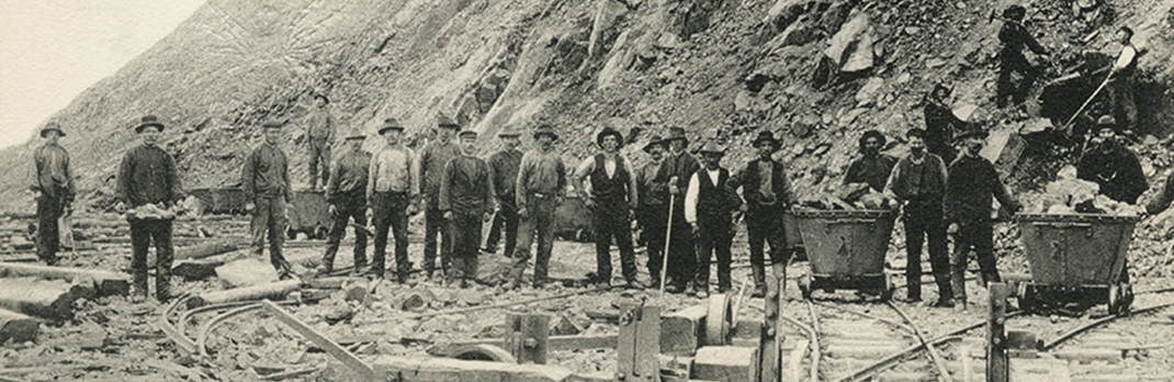 Employees mining iron ore in the 1890s.