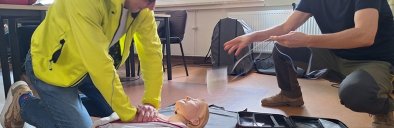 Employees participating in CPR training.